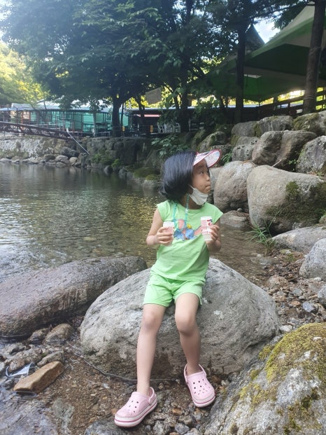 Enjoying a drink at the mountain stream